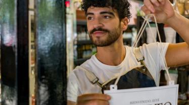 man holding sign